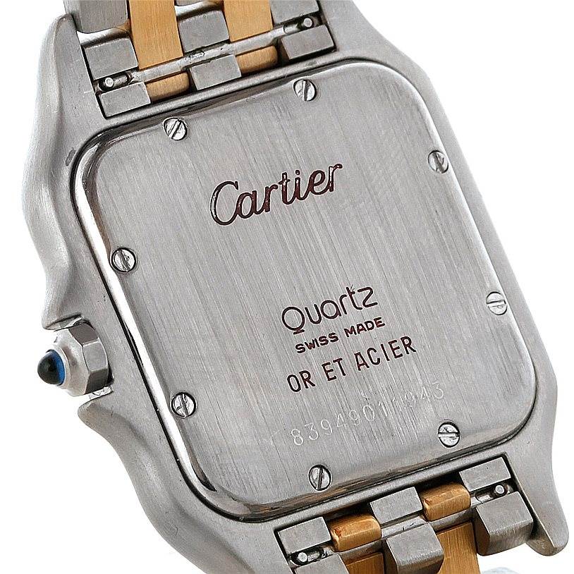 The image shows the back case of a Cartier Panthere W25028B6 Steel and Gold (two tone) Beige Dial W25028B6 Steel and Gold (two tone) Beige Dial watch, including part of the bracelet and inscriptions.