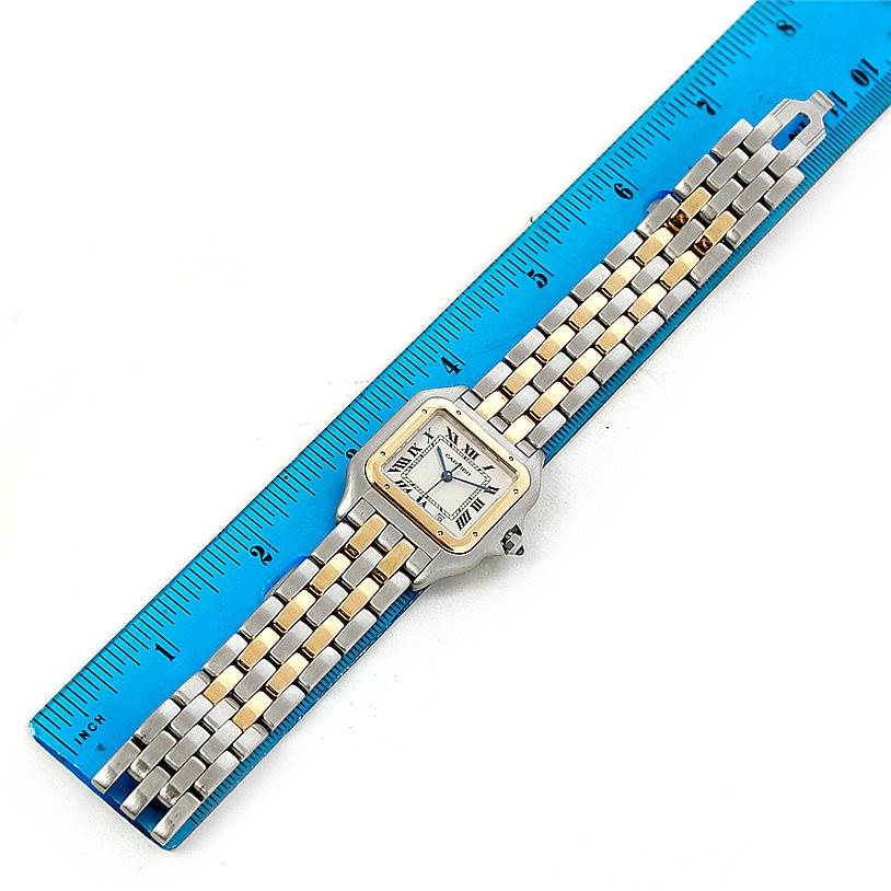 The Cartier Panthere W25028B6 Steel and Gold (two tone) Beige Dial W25028B6 Steel and Gold (two tone) Beige Dial watch is shown flat, capturing the face, bezel, and multi-tone bracelet, alongside a ruler for scale.