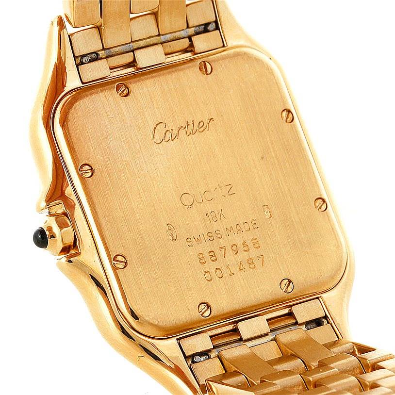 This image shows the rear case and part of the bracelet of the Cartier Panthere Yellow Gold Silver Dial Yellow Gold Silver Dial watch.