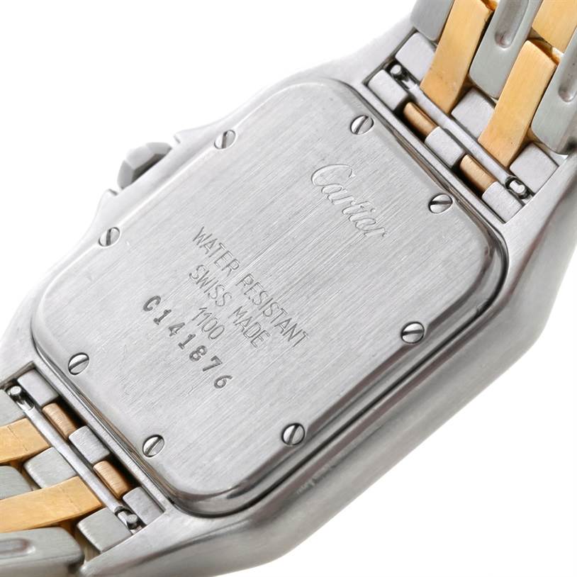 The image shows the back case and part of the bracelet of a Cartier Panthere W25028B6 Steel and Gold (two tone) Beige Dial W25028B6 Steel and Gold (two tone) Beige Dial model watch.