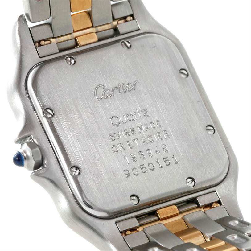 The image shows the back case and part of the bracelet of a Cartier Panthere W25028B5 Steel and Gold (two tone) Silver Dial W25028B5 Steel and Gold (two tone) Silver Dial watch with engravings and a visible blue crown.