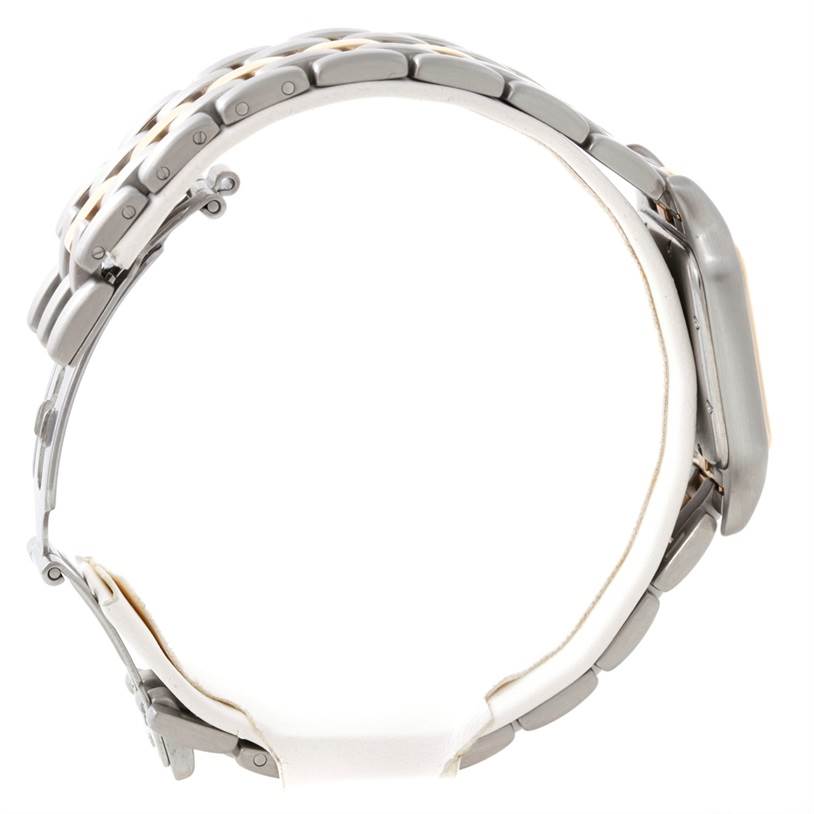 This image shows a Panthere model by Cartier, viewed from the side to highlight the bracelet links, case edge, and clasp area.