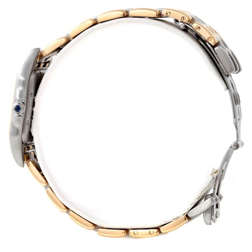 The image shows a side view of the Cartier Panthere W25028B8 Steel and Gold (two tone) Beige Dial W25028B8 Steel and Gold (two tone) Beige Dial watch, highlighting its bracelet and the crown with a blue cabochon.