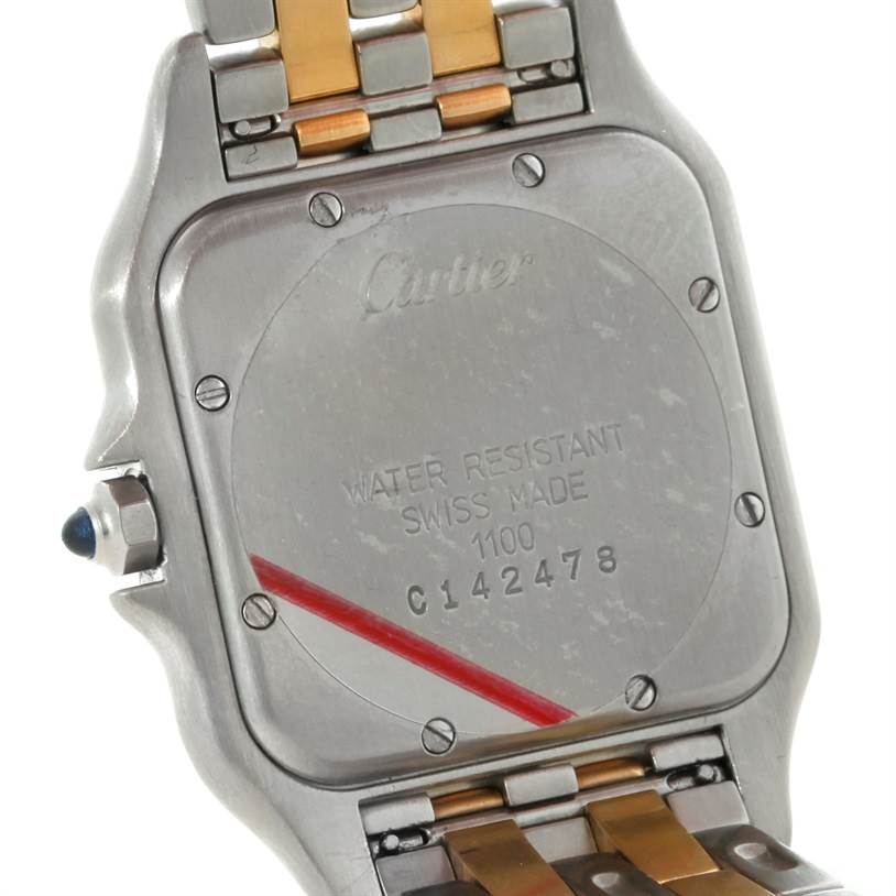 The image shows the case back and part of the bracelet of a Cartier Panthere W25028B6 Steel and Gold (two tone) Beige Dial W25028B6 Steel and Gold (two tone) Beige Dial watch.