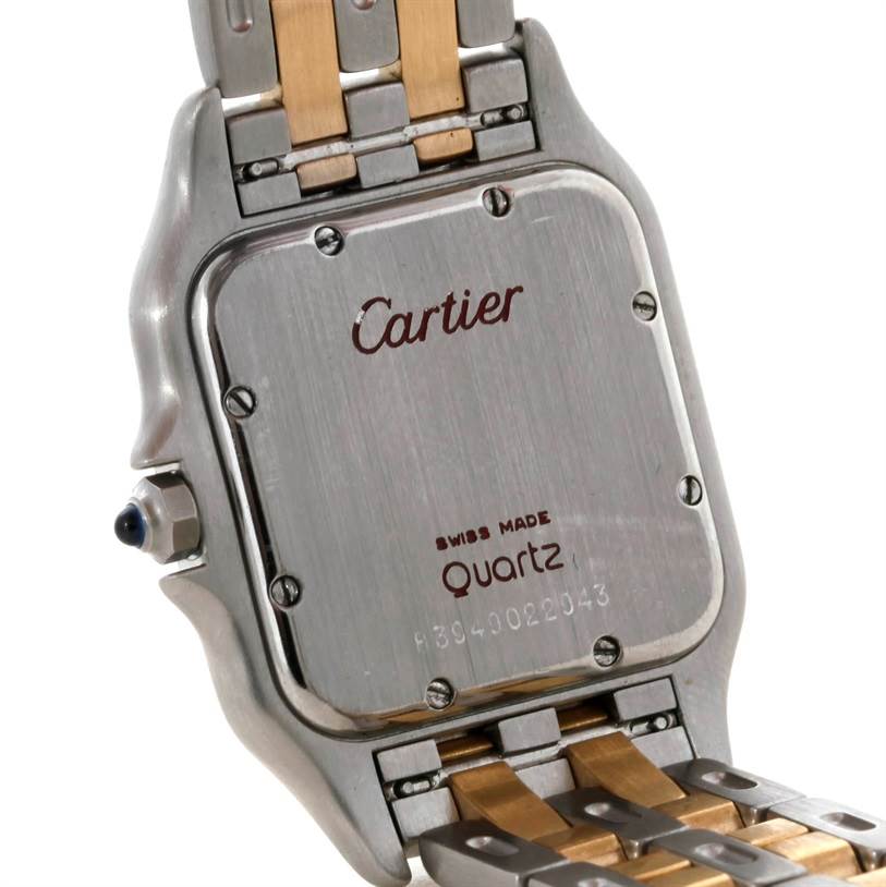 This image shows the back case of the Cartier Panthere W25028B6 Steel and Gold (two tone) Beige Dial W25028B6 Steel and Gold (two tone) Beige Dial watch, focusing on the branding and bracelet attachment.