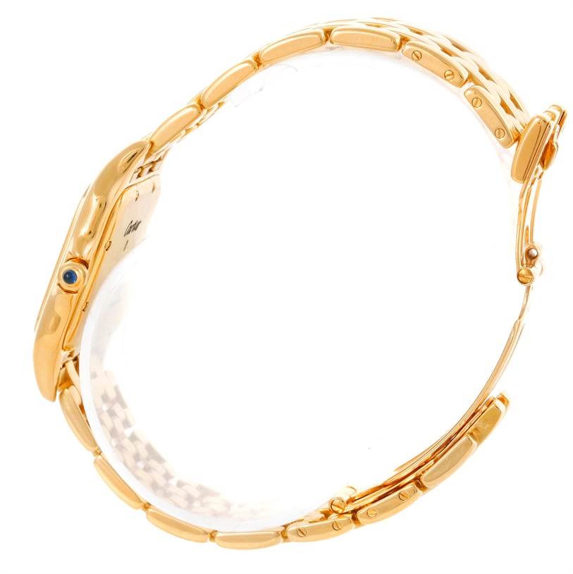 The image shows a side view of a gold Cartier Panthere Yellow Gold Silver Dial Yellow Gold Silver Dial watch, highlighting its bracelet and case.