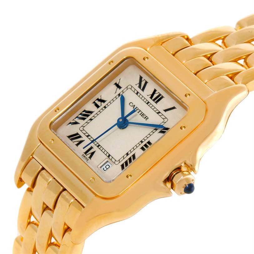 This image shows a close-up of the face and part of the bracelet of a Cartier Panthere Yellow Gold Silver Dial Yellow Gold Silver Dial watch at an angle.