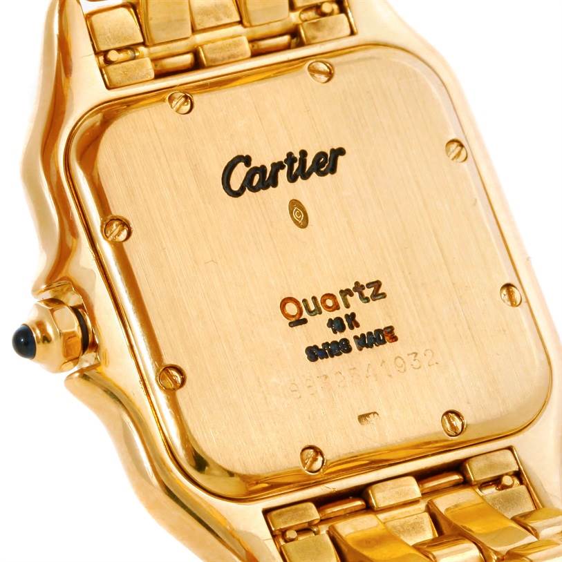 The image shows the back case and part of the gold bracelet of a Cartier Panthere Yellow Gold Silver Dial Yellow Gold Silver Dial Quartz watch.