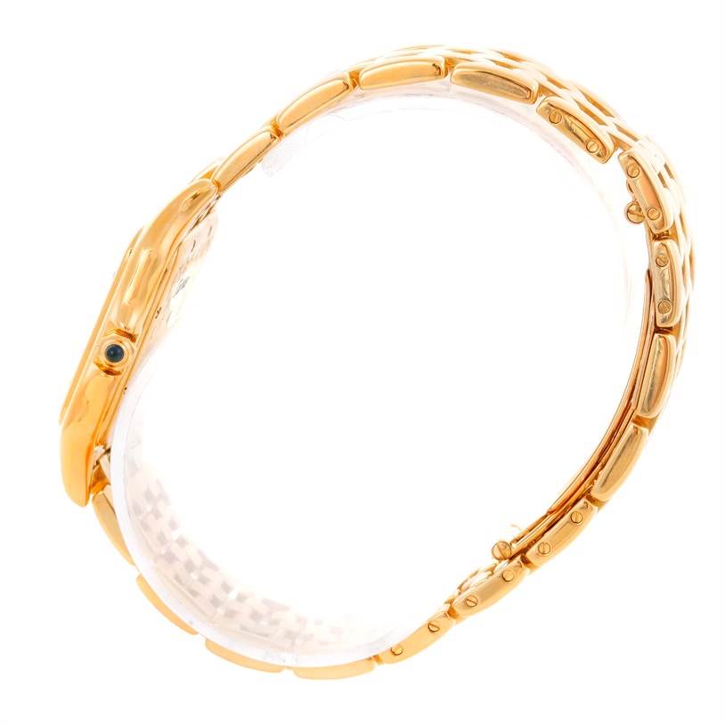 This image shows a side view of the Cartier Panthere W25014B9 Men's Yellow Gold Silver Dial W25014B9 Men's Yellow Gold Silver Dial watch, focusing on the gold bracelet and case.