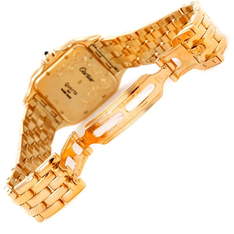 The image shows the back case and clasp of a Cartier Panthere W25014B9 Men's Yellow Gold Silver Dial W25014B9 Men's Yellow Gold Silver Dial model watch in a gold finish.