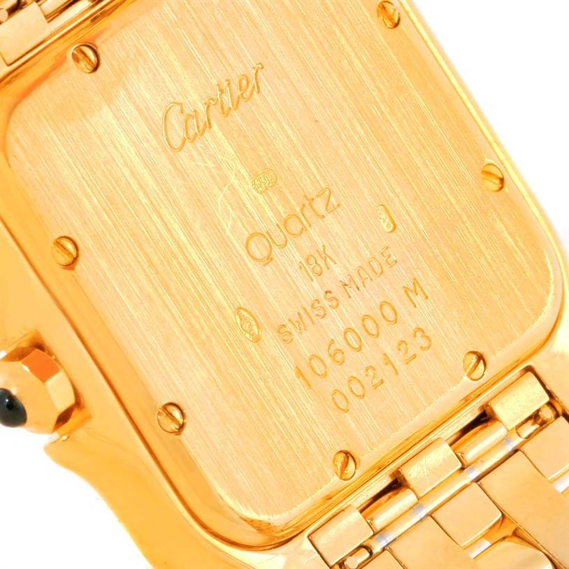 This image shows the back casing and part of the bracelet of a Cartier Panthere W25014B9 Men's Yellow Gold Silver Dial W25014B9 Men's Yellow Gold Silver Dial model watch.