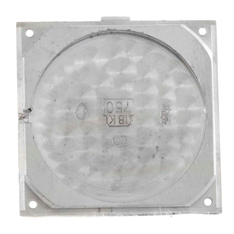 This image shows the inner case back of a Cartier Tank Classic Men's White Gold Beige Dial Men's White Gold Beige Dial watch.