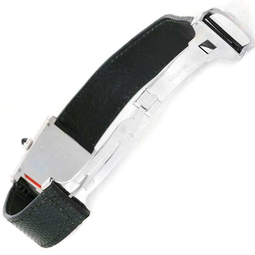 This image shows the underside and clasp mechanism of the Cartier Tank Classic Men's White Gold Beige Dial Men's White Gold Beige Dial watch with a black leather strap.