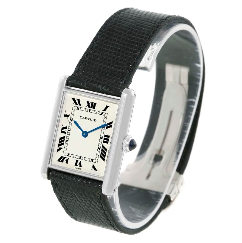 The image shows a Cartier Tank Classic Men's White Gold Beige Dial Men's White Gold Beige Dial watch at a slight angle, highlighting the face, crown, and black leather strap.