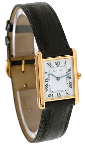 The image shows a side angle of the Cartier Tank Classic Men
s Steel and Gold (two tone) White Dial Men
s Steel and Gold (two tone) White Dial watch, highlighting its rectangular face, leather strap, and gold casing.