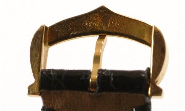 This image shows the buckle of a Tank Classic watch strap by Cartier from a close-up, front-facing angle.