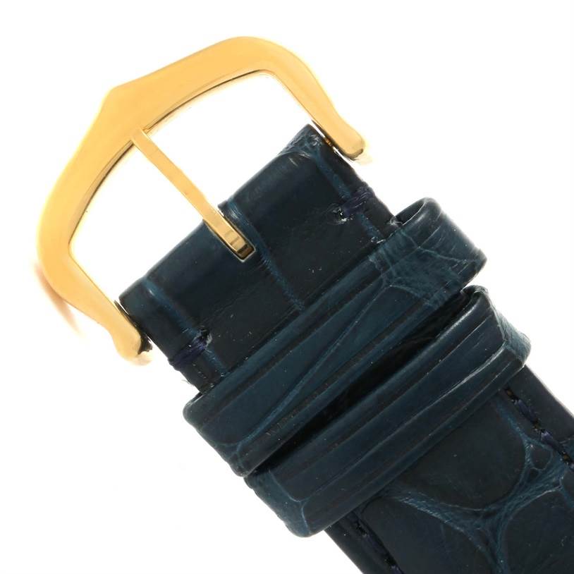 The image shows the buckle and a portion of the strap of a Tank Classic model by Cartier.