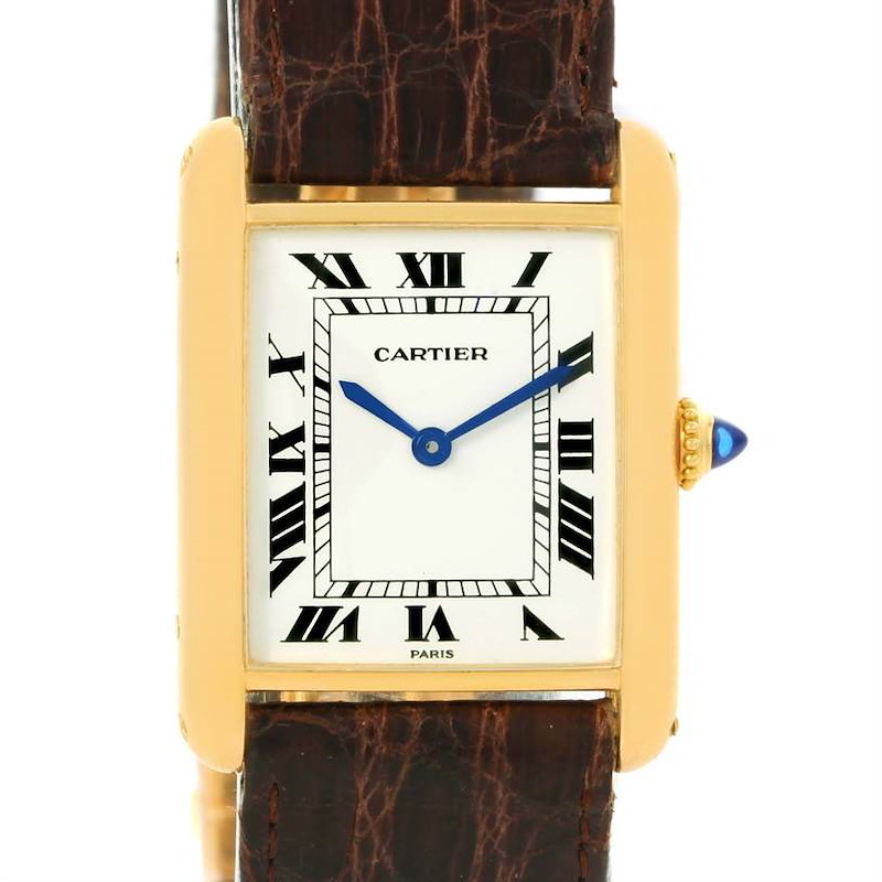 The image shows a front view of the Cartier Tank Classic watch with its rectangular dial, Roman numerals, and leather strap.