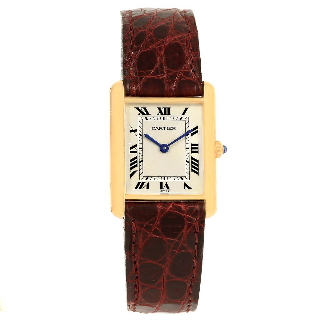 The image shows a front view of the Cartier Tank Classic 1140 Yellow Gold White Dial 1140 Yellow Gold White Dial watch, featuring its face, gold case, and brown leather strap.