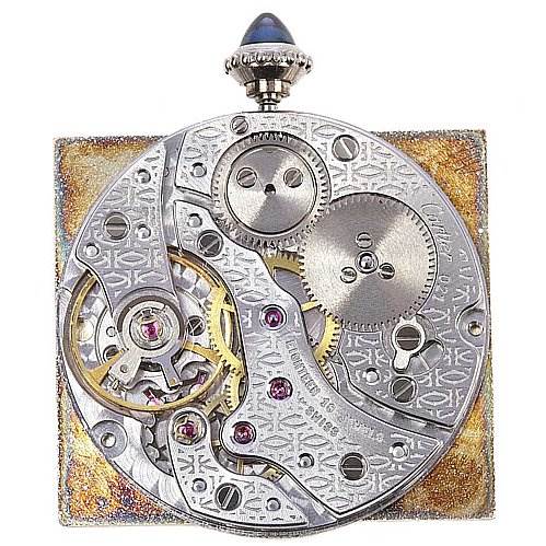 This image shows the internal mechanism and gears of a Cartier Tank Classic Platinum White Dial Platinum White Dial watch, viewed from a top-down angle.