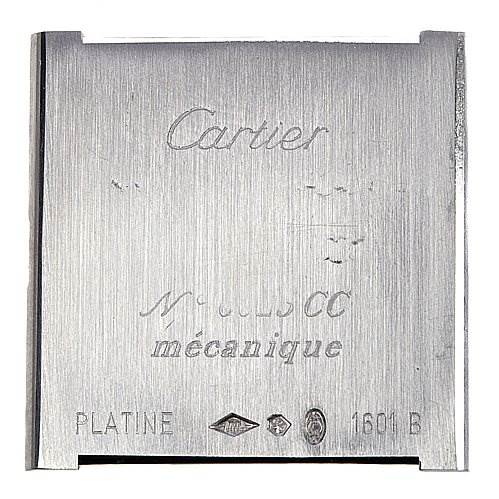 The image shows the back case of a Cartier Tank Classic Platinum White Dial Platinum White Dial watch, displaying engravings and model details.