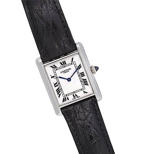 The image shows a Cartier Tank Classic Platinum White Dial Platinum White Dial watch from a top-down angle, revealing the face, Roman numeral markers, and black leather strap.