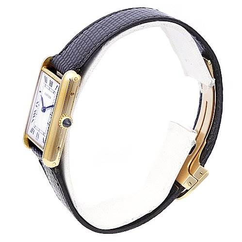 The image shows a side view of the Cartier Tank Classic Yellow Gold White Dial Yellow Gold White Dial watch, showcasing the case, crown, strap, and clasp.