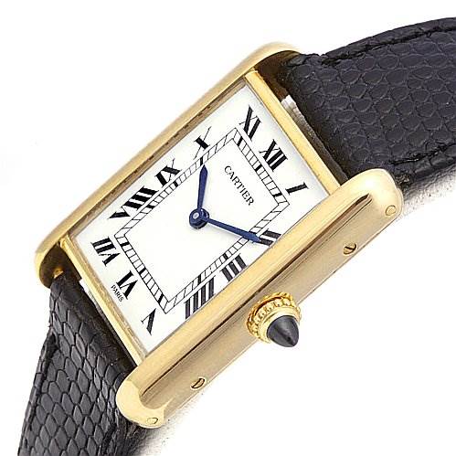 The image shows a Cartier Tank Classic Yellow Gold White Dial Yellow Gold White Dial model watch at a slight angle, highlighting the gold case, black leather strap, and blue hands.
