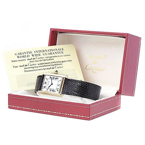 The image shows the Cartier Tank Classic Yellow Gold White Dial Yellow Gold White Dial watch in its box with the international warranty card.