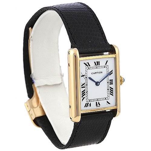 The image shows a Cartier Tank Classic Yellow Gold White Dial Yellow Gold White Dial watch from a three-quarter angle, highlighting the face, hands, strap, and buckle.