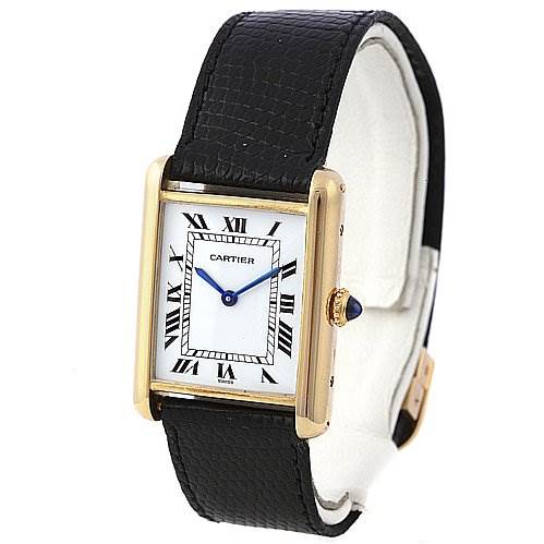 The image shows a Cartier Tank Classic Yellow Gold White Dial Yellow Gold White Dial watch at a front three-quarter angle, displaying its black leather strap, rectangular dial, and gold case.
