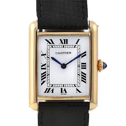 This image shows a front view of the Cartier Tank Classic Yellow Gold White Dial Yellow Gold White Dial watch, featuring a gold rectangular case, white dial with Roman numerals, and black strap.