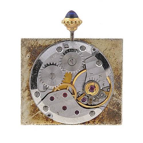 This image shows the internal movement and gears of a Cartier Tank Classic Yellow Gold White Dial Yellow Gold White Dial model watch from a top-down angle.