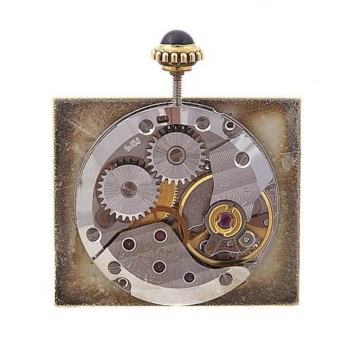 This is an image of the inner movement mechanism of a Cartier Tank Classic Yellow Gold Beige Dial Yellow Gold Beige Dial watch, shown from a top-down angle.