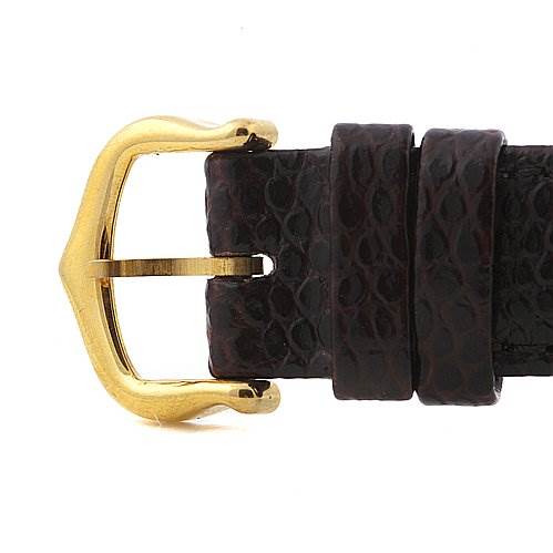 This image shows a close-up of the gold buckle and dark leather strap of the Cartier Tank Classic Yellow Gold Beige Dial Yellow Gold Beige Dial watch.