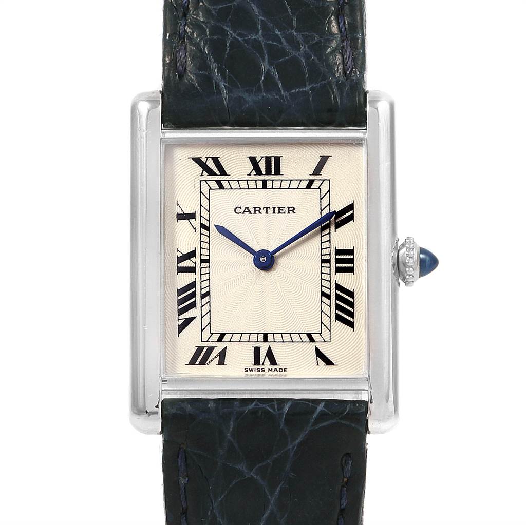 The image displays a front view of a Cartier Tank Classic Men's Platinum Silver Dial Men's Platinum Silver Dial watch, showcasing its rectangular face, Roman numerals, and black leather strap.