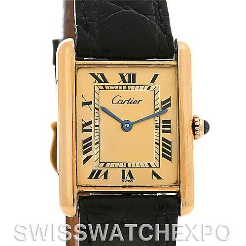This image shows a Cartier Tank Classic Yellow Gold Champagne Dial Yellow Gold Champagne Dial model watch from the front, highlighting its face, Roman numerals, and crown.
