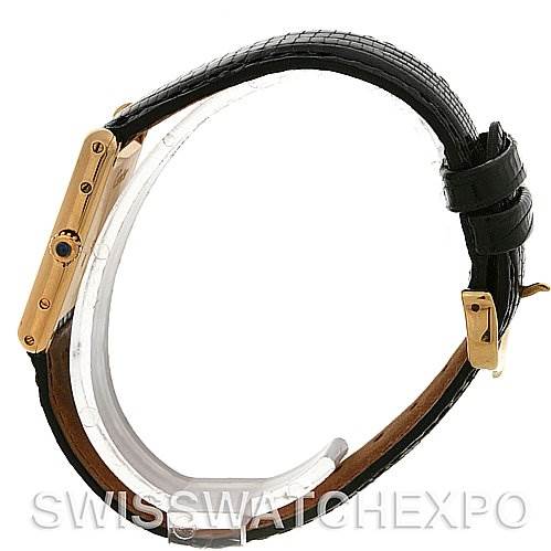 The image shows a Cartier Tank Classic Yellow Gold White Dial Yellow Gold White Dial watch from a side angle, highlighting its case, crown, and leather strap.