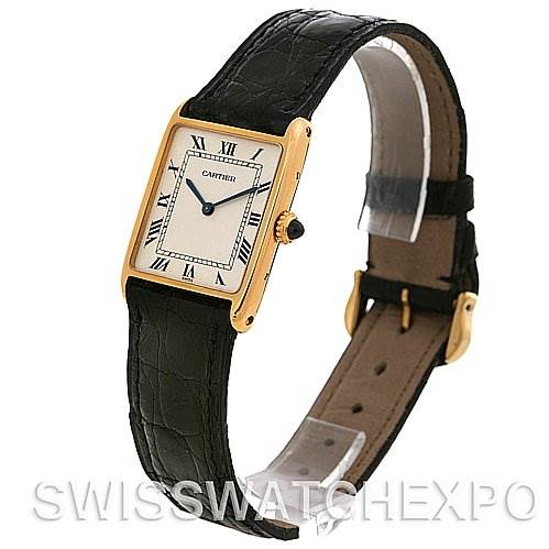The image shows a Cartier Tank Classic 2466 Yellow Gold Silver Dial 2466 Yellow Gold Silver Dial watch at a slight angle, highlighting the rectangular face, black leather strap, and gold-tone case.