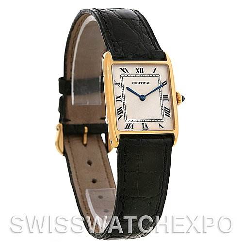 The image shows a side perspective view of the Cartier Tank Classic 2466 Yellow Gold Silver Dial 2466 Yellow Gold Silver Dial with a focus on the face, bezel, and black leather strap.