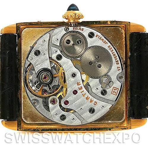 This image shows the backside and internal mechanical parts of a Cartier Tank Classic 2466 Yellow Gold Silver Dial 2466 Yellow Gold Silver Dial watch at a straight-on angle.
