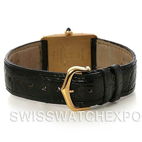 The image shows the back view of the Cartier Tank Classic 2466 Yellow Gold Silver Dial 2466 Yellow Gold Silver Dial watch, highlighting the black leather strap and gold-tone buckle.