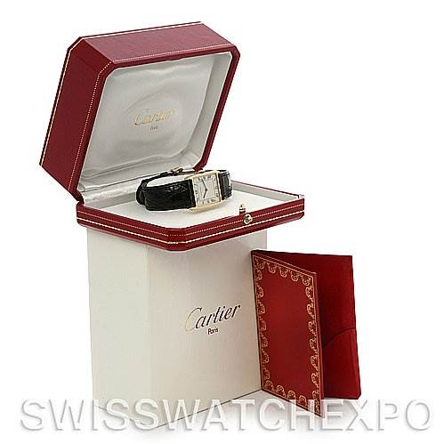 The image shows a Cartier Tank Classic 2466 Yellow Gold Silver Dial 2466 Yellow Gold Silver Dial model watch in its red presentation box, along with a matching red booklet.