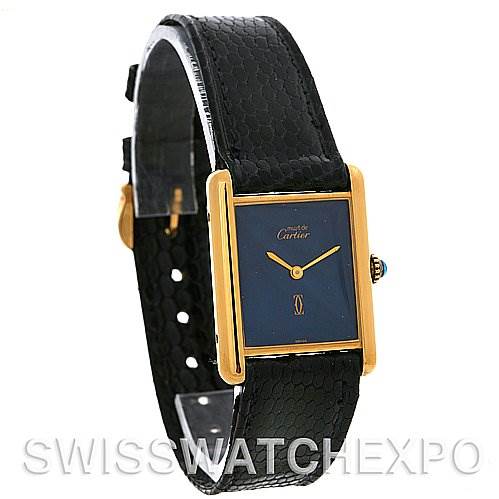The image shows a Cartier Tank Classic Yellow Gold Blue Dial Yellow Gold Blue Dial watch at a slight front angle, highlighting its rectangular dial, gold case, and black leather strap.