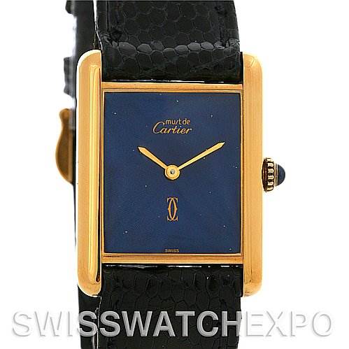 The image shows a front angle view of a Cartier Tank Classic Yellow Gold Blue Dial Yellow Gold Blue Dial watch, highlighting the dial, hands, and strap.