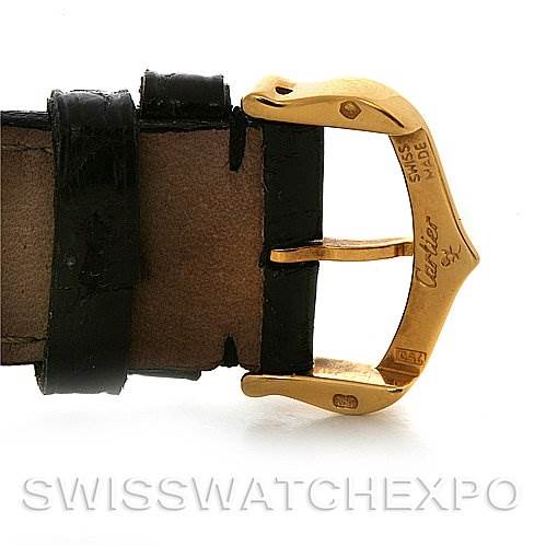 Close-up of the gold buckle and black leather strap of a Cartier Tank Classic Yellow Gold White Dial Yellow Gold White Dial watch, showing the brand's engravings.