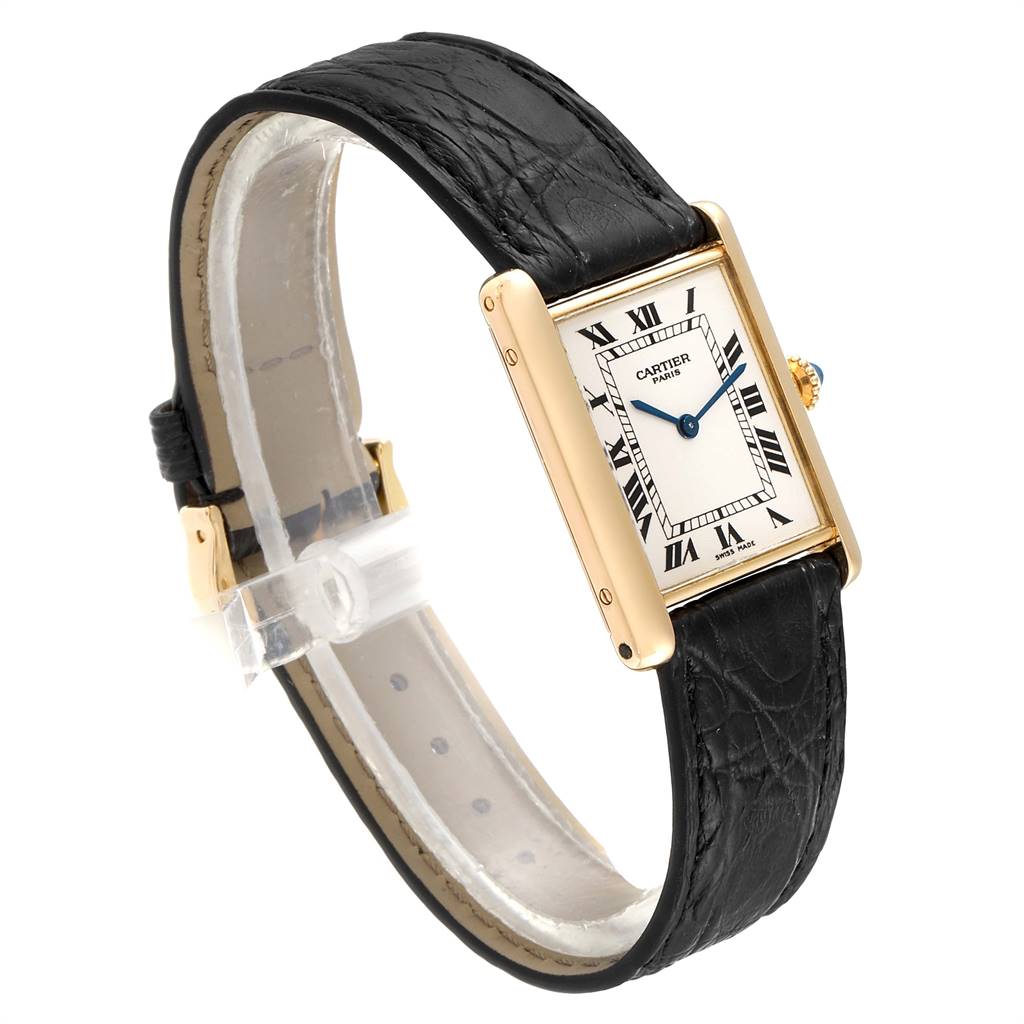 The Cartier Tank Classic Men
s Yellow Gold Silver Dial Men
s Yellow Gold Silver Dial watch is shown at a three-quarter angle, highlighting the face, bezel, strap, and buckle.