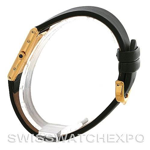 A side view of the Cartier Tank Classic Yellow Gold White Dial Yellow Gold White Dial watch, showcasing its gold case, black leather strap, and buckle.