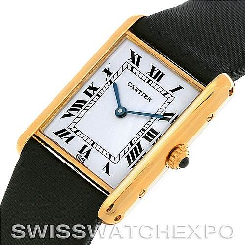 This image shows a Cartier Tank Classic Yellow Gold White Dial Yellow Gold White Dial watch, highlighting its rectangular face, gold case, crown, and black leather strap.
