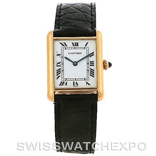 The image shows a front view of a Cartier Tank Classic Yellow Gold White Dial Yellow Gold White Dial watch with a gold rectangular case and a black leather strap.